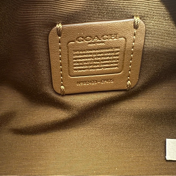 NWT Coach CP475 Nolita Barrel Bag In Signature Canvas In KHAKI/SADDLE - Picture 9 of 11